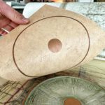 Linoldruck, 22 x 22 cm, Kupfer auf Beige/Ocker